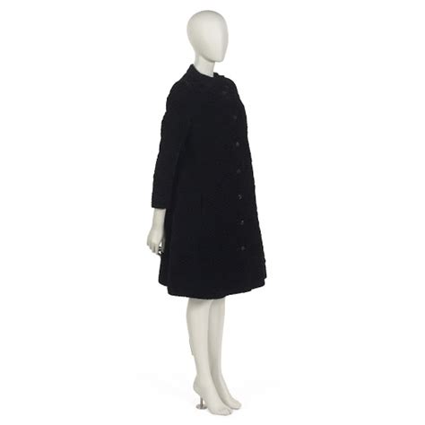 Evening coat of black machine matelasse velvet 